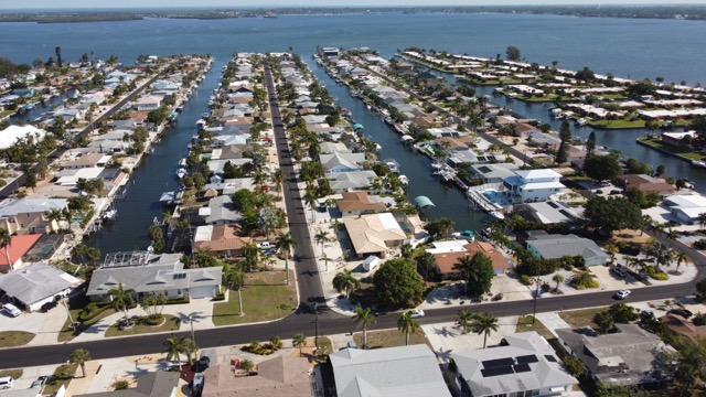 Aerial view of San Remo Shores neighborhood and canals