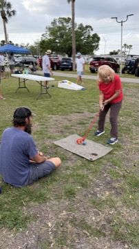 Residents playing games at a community event